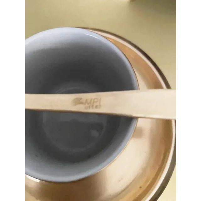 Beautiful coffee game with a tray. It is very original and different. It has the base in brass and the cups in Princeana....