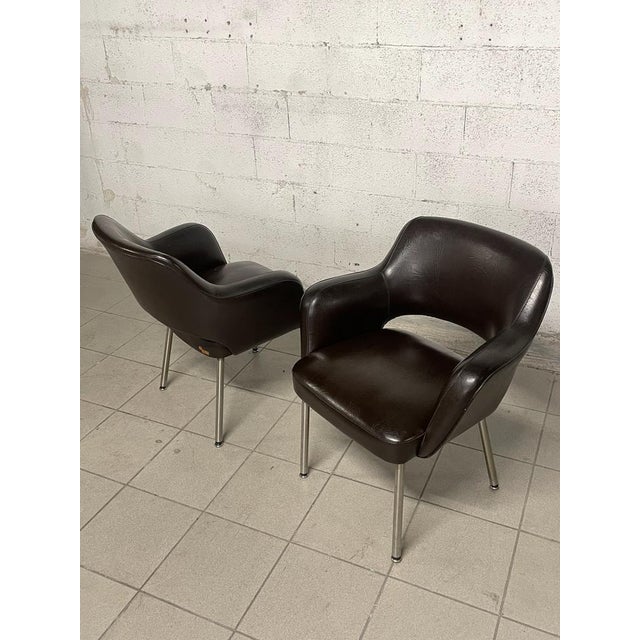 Pair of 70s armchairs produced by the Turin Mobiltecnica. The armchairs have an iron structure and still original Sky...