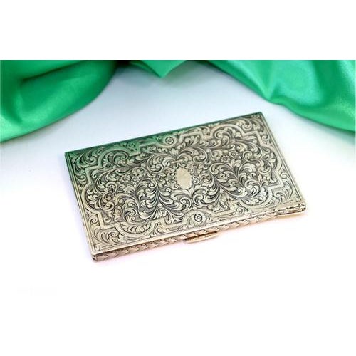 Silver Cigarette Case with Floral Reliefs, in Very Good conditions. Designed from 2000 This piece has an attribution mark,...