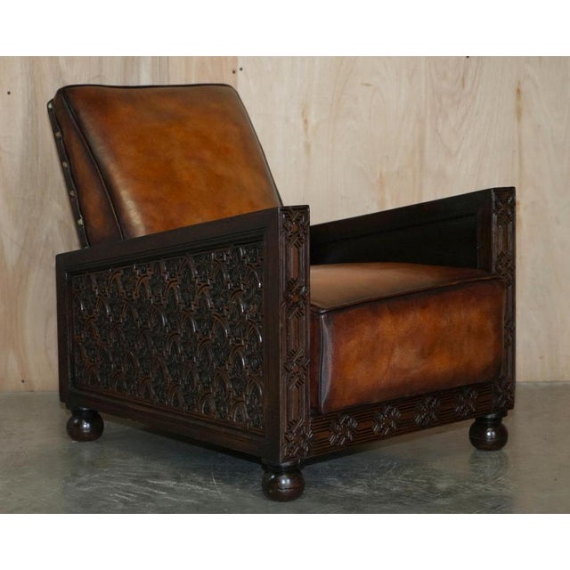 This is a stunning fully restored pair of antique hand dyed Cigar brown leather Art Deco club armchairs with hand carved...