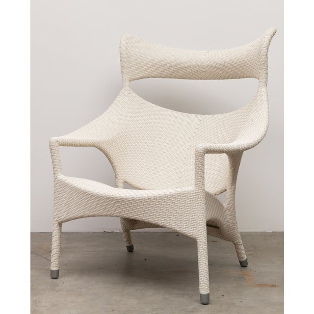Janus Et Cie High Back Lounge Chairs in Limestone finish. Synthetic fade resistant Janus fiber stands handwoven over an...