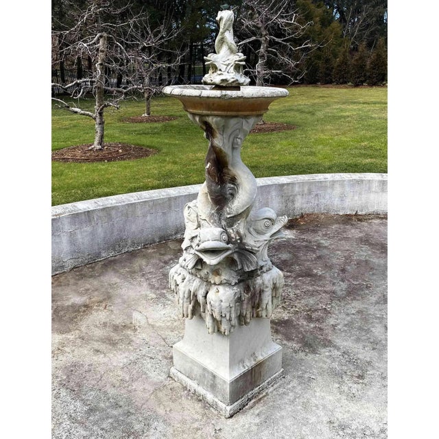 Antique, late 19th century carved white statuary fountain. Italian carrara marble featuring a unique double stacked set of...