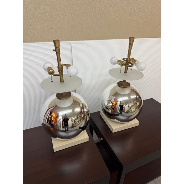 Design Plus Gallery presents a pair of Italian Gazing Globe Table Lamps from Sherrill Canet Interiors. The lamps have a...