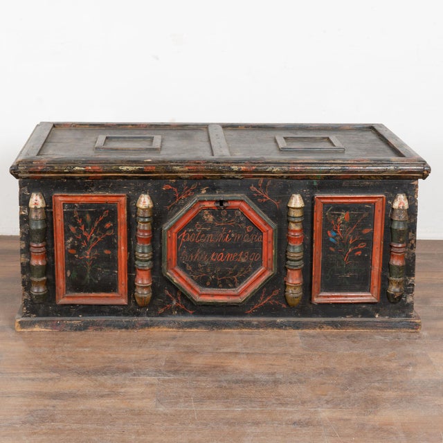 Original hand painted flat top trunk dated 1890 from Hungary, crafted in pine. The original hand painted folk art finish...