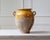 This striking 19th-century French terracotta jug is a beautiful example of utilitarian pottery turned timeless décor....