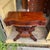 Large crotch mahogany Empire style(1800s) flip-top game table—top swivels to reveal a space for your favorite board or...