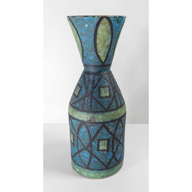 We are selling this gorgeous Mid-Century Italian Modern pottery vase. This vase has great hand painted geometric designs...