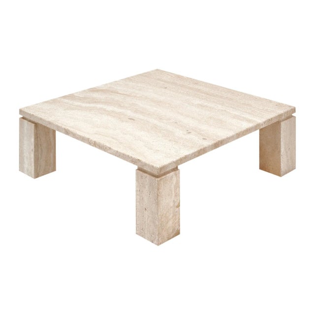 Coffee table from France made entirely of travertine stone. This Modernist design features a large square surface...