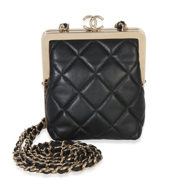 Item #: 154205 Interior Material: Fabric Dimensions: 4 x 4.25 x 1.5 in Handbag Closure Type: Kiss Lock Strap Length: 21 in...