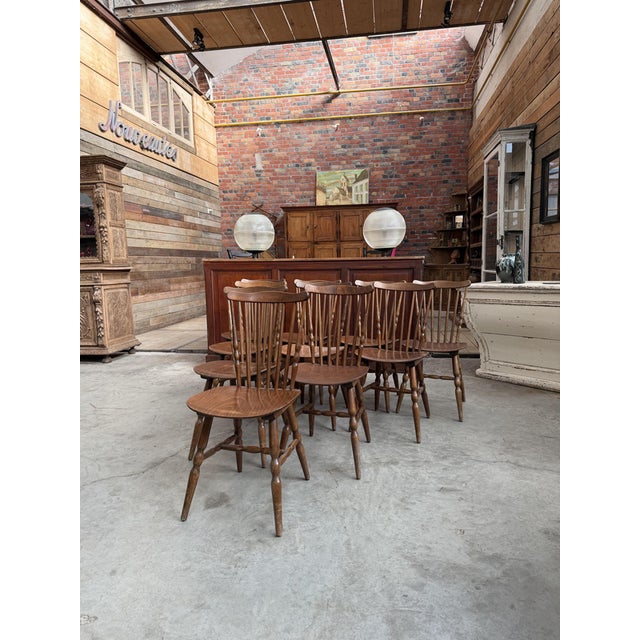 This set of 10 bistro chairs has retained its beautiful patina from years of use. A very comfortable model thanks to its...