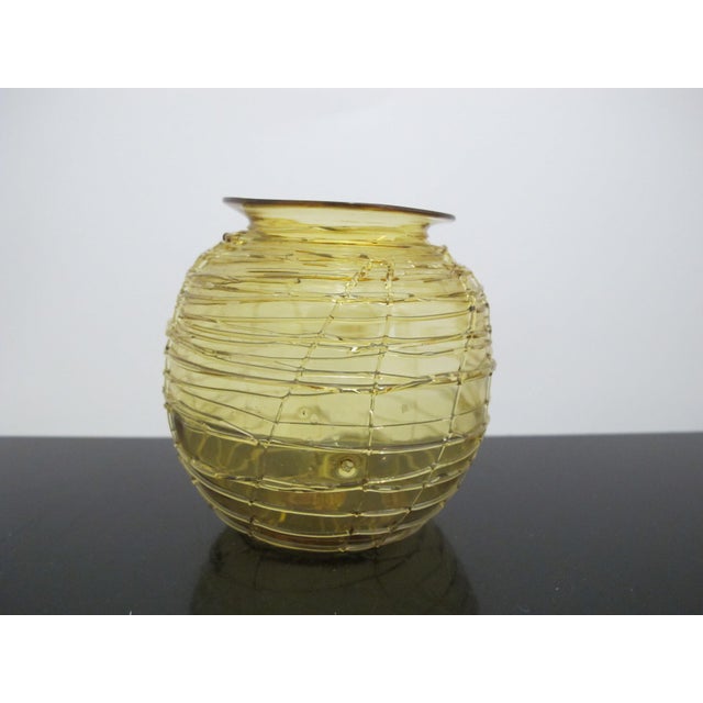 Lovely amber tone threaded glass globe vase. Measures 3" x 3 1/2" tall. Excellent condition, no chips, cracks, or repairs....