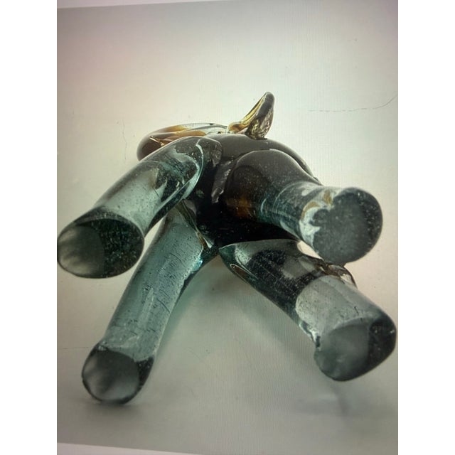 Add a touch of vintage elegance to your collection with this striking pair of sculptural art glass elephants. Featuring...