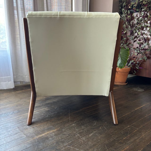 The smooth lines of a Mid-Century Modern piece are a lovely thing. This vintage piece has been reimagined in a clean white...