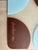 a set of 8 Jonathan Adler designed reversible vinyl placemats. Printed with circles in robins egg blue and brown on a...