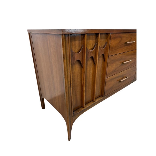 Make a statement with this 1960’s Mid-Century Modern Kent Coffey “Perspecta” walnut dresser, beautifully refinished to...