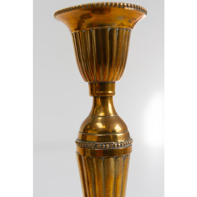 Vintage Danish Brass Candlesticks. Set of 4. Set of five candle holders in solid brass/malm from Denmark circa 1930-1960....