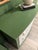 Beautiful dresser/accent table with a rich green finish and stunning floral drawer fronts. This piece has been...