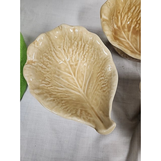 Bring a touch of vintage Portuguese charm to your table with this set of 7 Vintage SECLA Pottery Majolica Cabbage Bowls....