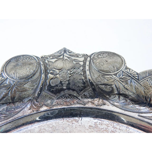 Circa 1890's Wilcox Silverplate handled basket. Aesthetic Movement design which includes grapes, birds and fans. Marked...