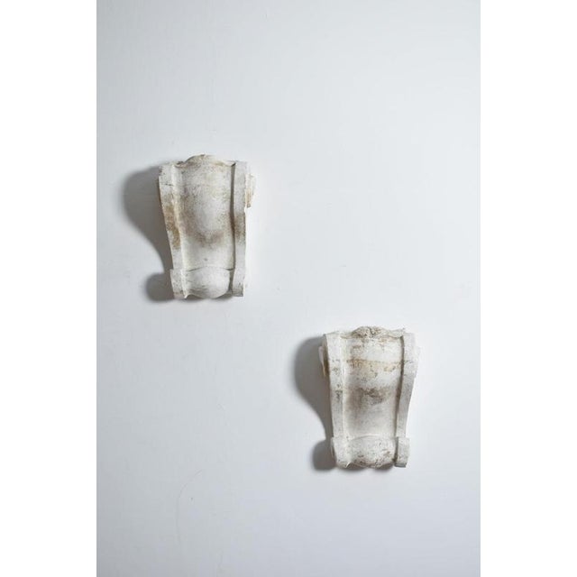 Pair of Paster scrolls wall sconces, 1930s. Height: 46 cm - 18.11 in Length: 31 cm - 12.2 in Width: 15 cm - 5.91 in Up to...
