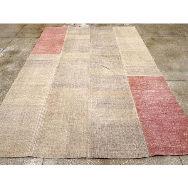 A vintage Turkish flatweave Kilim room size carpet handmade during the Mid-20th Century. Measures: 8' 4" x 12' 0".