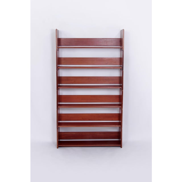 Rare modular shelving unit designed by Ilmari Tapiovaara and manufactured by Laukaan Puu, Finland 1955. The shelves are...