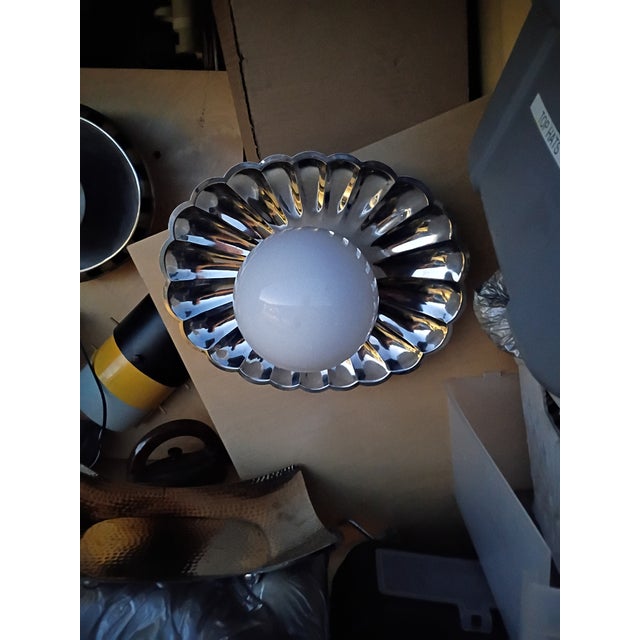 Custom nade wall lamp silver plated. with a Nice design can be displayed with globe or with half mirrored light bulb a...