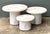 This vintage set of three side tables is crafted from textured resin to mimic the appearance of stone, bringing a...