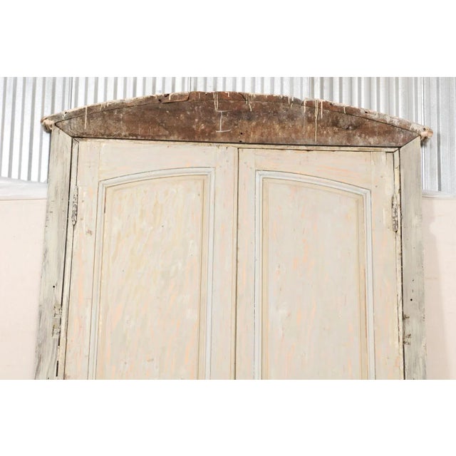 This is an impressive pair of tall 19th century French doors with their original casing and subtle arched crest top. This...