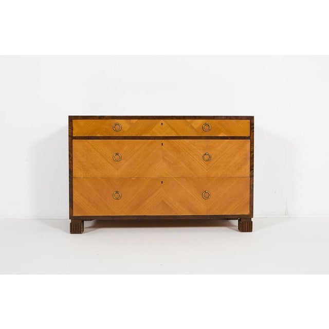 Beautiful chest of drawers from Axel Larsson produced in 1930’s by Svenska Möbelfabrikerna Bodafors. It features three...