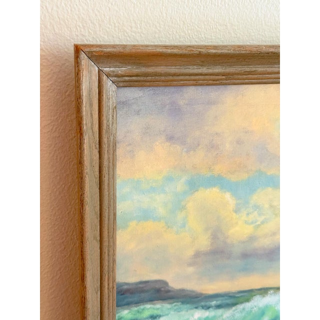 Serene and lovely vintage impressionist seascape beach painting with frothy waves crashing against a rock, and a soft dusk...