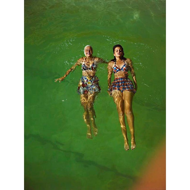 Floating 1961 Two women in swimwear float on water 1961. Toni Frissell Antoinette Frissell Bacon (March 10, 1907 – April...