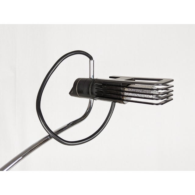 Adjustable Alogena 50 watt table lamp by B. Gecchelin for Oluce, 1970s. Chrome-Plated & black metal structure with black...