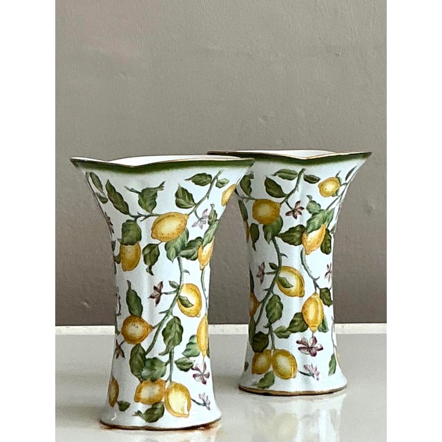 A delightful touch of European garden elegance, this exquisite pair of vintage vases captures the eternal freshness of a...