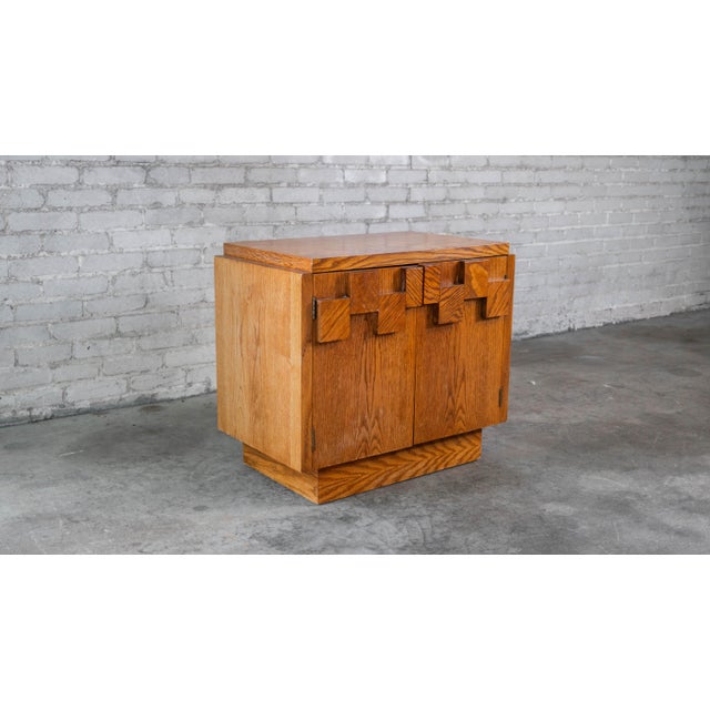 Lane Furniture "Staccato" nightstand cabinet, circa 1970s. Architectural aesthetics with Brutalist design. Oak...