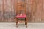 This country style 19th Century ladderback side chair has been reupholstered in a beautiful antique suzani throw. Seat:...