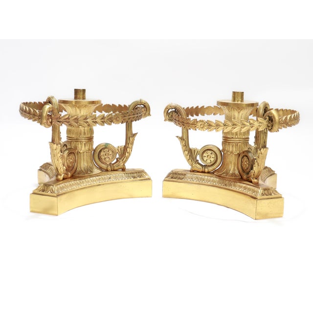 A fine pair of antique French bases for etageres. By Pierre-Phillippe Thomire. In doré gilt bronze. Each with a central...