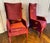 A pair of Luxury custom-made designer chairs featuring rich red velvet. This exquisite piece combines elegance and comfort...