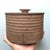 This piece, created by Nanni Valentini for Ceramica Arcore in the 1970s, is a container with a lid. It can hold various...