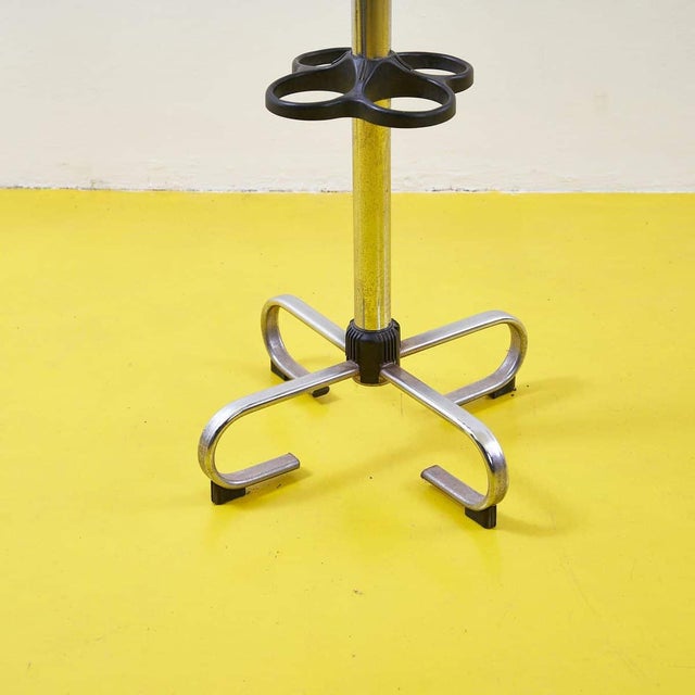 Explore the charm of vintage design with this chrome-plated metal coat rack, perfect for adding a touch of elegance to any...