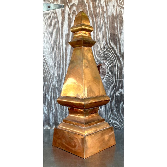Introduce a piece of architectural intrigue and bohemian charm into your space with this Vintage Boho Copper Spire....