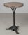 A 19th century French cast iron bistro table with pedestal base. Good quality heavy casting with dolphin head feet and...