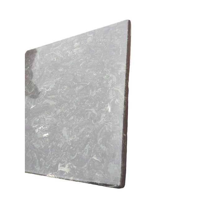 This stunning dining table is perfect for any dining room. With a 36x36 inch square marble top and an elegant iron...