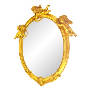 Early Deluxe 20th Century Gilded Wood Oval Mirror With Elegant Angel Cupids For Sale