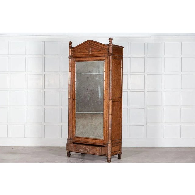 Circa 1870. 19th Century. French Faux Bamboo Walnut Mirrored Armoire. We have our own workshop, restorers and finishers....