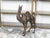 A French turn of the century bronze statuette from the early 20th century depicting a camel with two humps, showcasing...