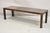 Vintage Mid Century Modern Brown Tortoiseshell Lacquer Parsons Style 54" Bench Coffee Table with Loose Cushion. Circa Mid...