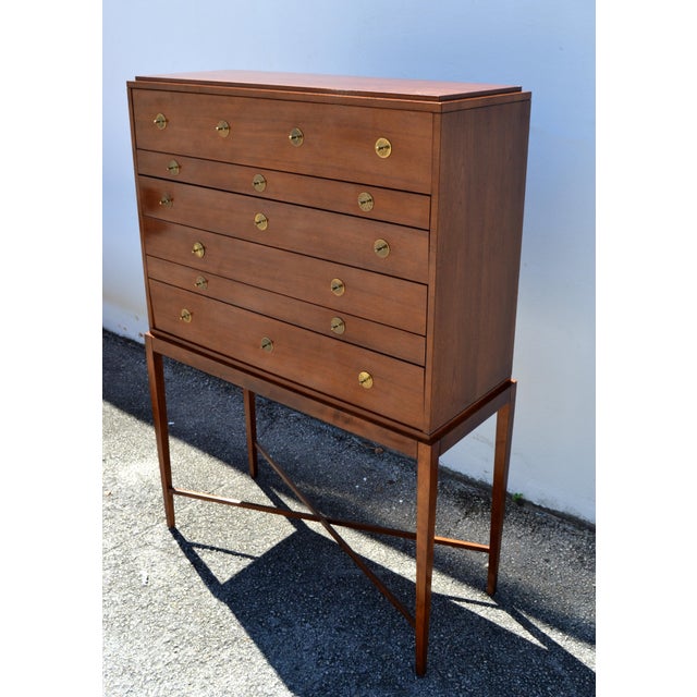 1960s charming Chest on Stand manufactured by Baker Furniture Company, one of America's most respected traditional...