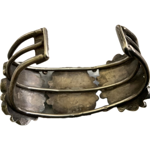 Striking vintage Southwestern turquoise and silver cuff bracelet featuring an impressive arrangement of approximately 27...