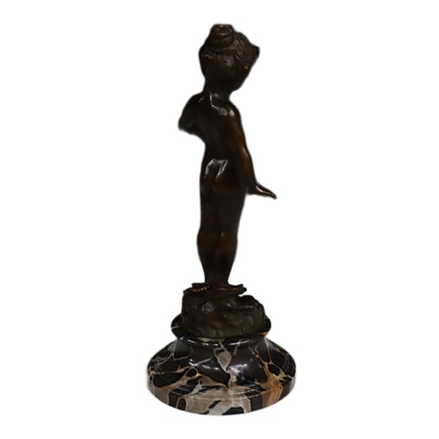 Patinated bronze figure titled Violet, attributed to American sculptor Edward Henry Berge (1876–1924). The sculpture...